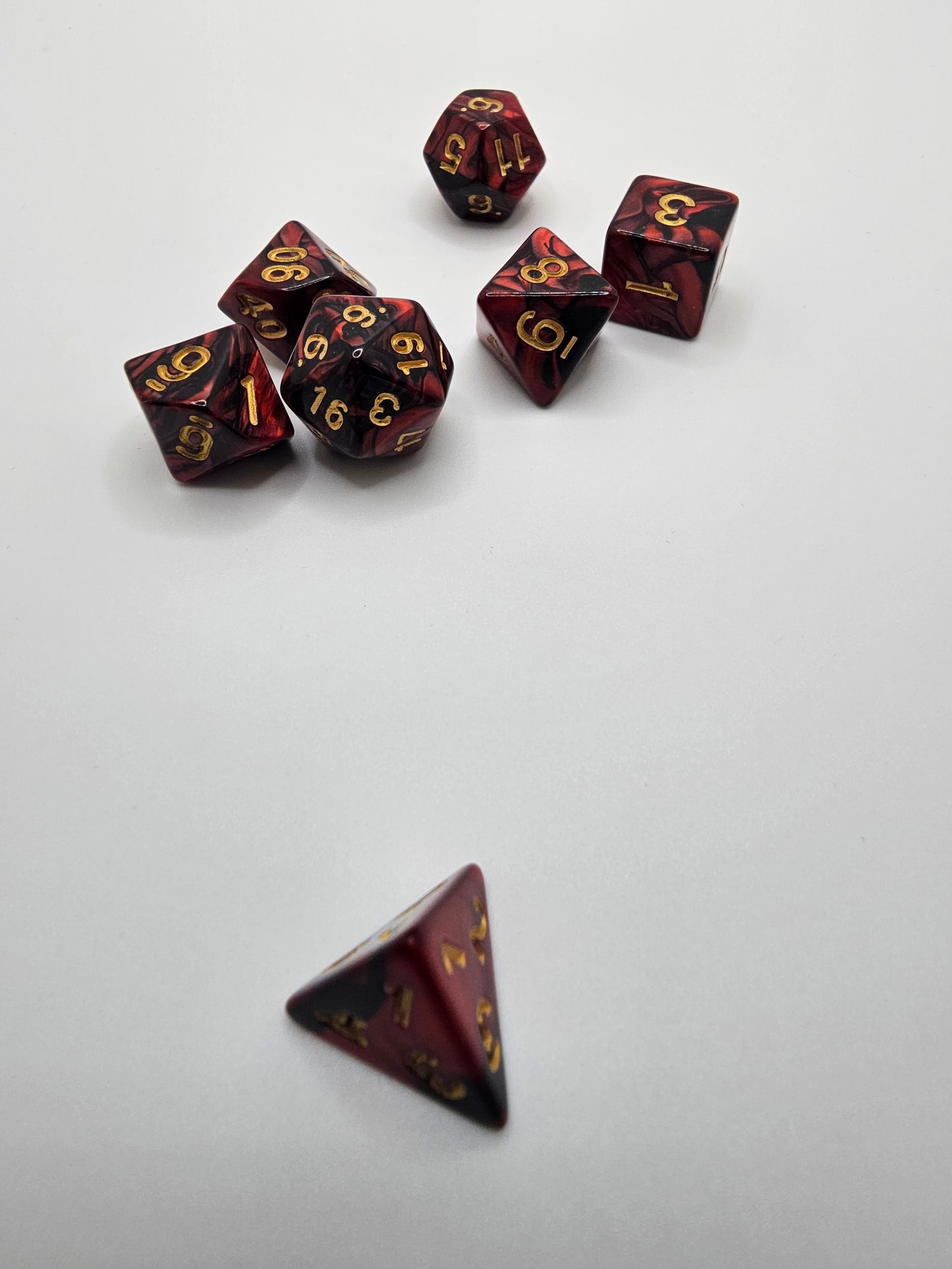 Black and Red marble 7pc Dice Set.